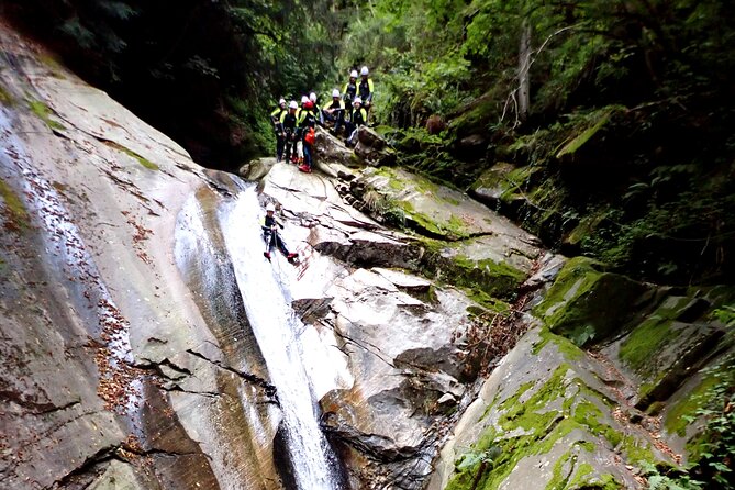Basic Corippo Canyoning Experience in Valle Verzasca - The final slide into Lake Vogorno