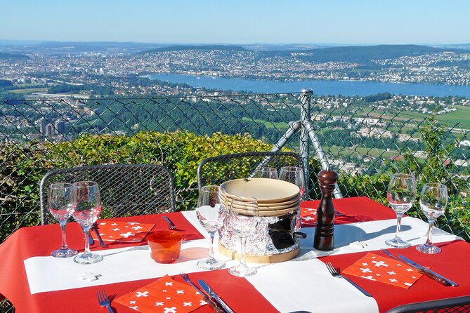 Culinary Tour from Zurich with Traditional Swiss Cheese Fondue Dinner - A welcome drink with a view over Lake Zurich