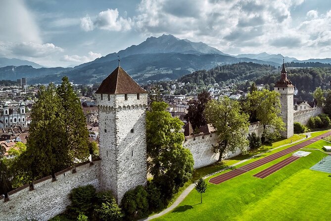 Lucerne Day Trip from Zurich Including Lake Lucerne Cruise - Chapel Bridge, the Jesuit Church, and the old center