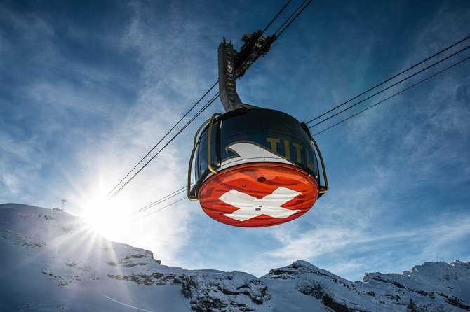Mt Titlis Cable Car from Engelberg with Ice Flyer - The Ice Flyer over snow and crevasses
