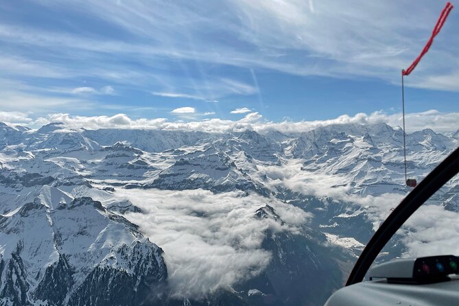 Private helicopter tour to the Swiss Alps - see the Eiger, Monch and Jungfrau - Flying past Jungfraujoch and the Sphinx