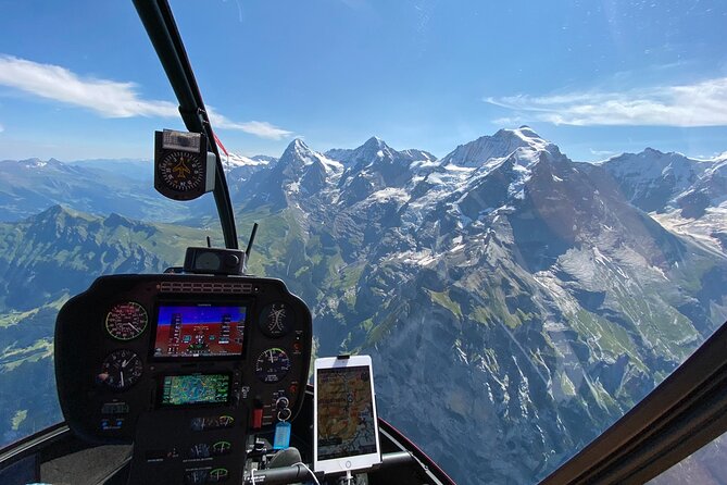 Private Swiss Alps helicopter tour over snow covered mountain peaks and glaciers - Schilthorn, Bond films, and Lauterbrunnen