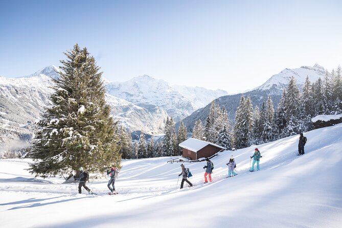 Snowshoe Adventure in the Swiss Alps - Getting fitted with snowshoes and poles