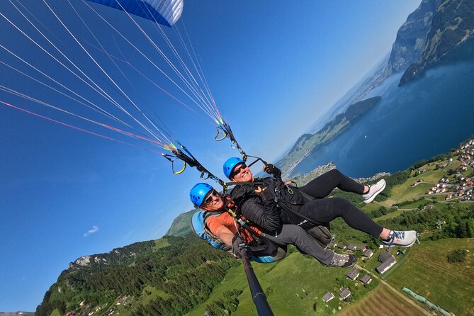 Tandem Paragliding Flight in the Lucerne Region - Landing on a grassy field