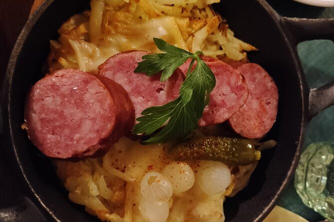 Taste Lausanne – A Full Swiss Food Tour by Do Eat Better - Vaud cheese beside Notre-Dame de Lausanne