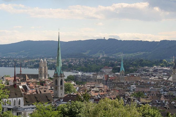 The Best of Zurich Including Panoramic Views in a Small Group Walking Tour - Fraumünster and Grossmünster across the Limmat