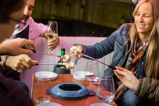 Zurich eTukTuk Private Tour - with Cheese Fondue and Wine - Bahnhofstrasse and Zurich’s polished front door