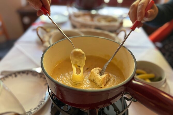 Zurich Food Tour with 10 Local Delicacies, Cheeses & Chocolates - Cheese, schnapps, and Swiss drinking traditions
